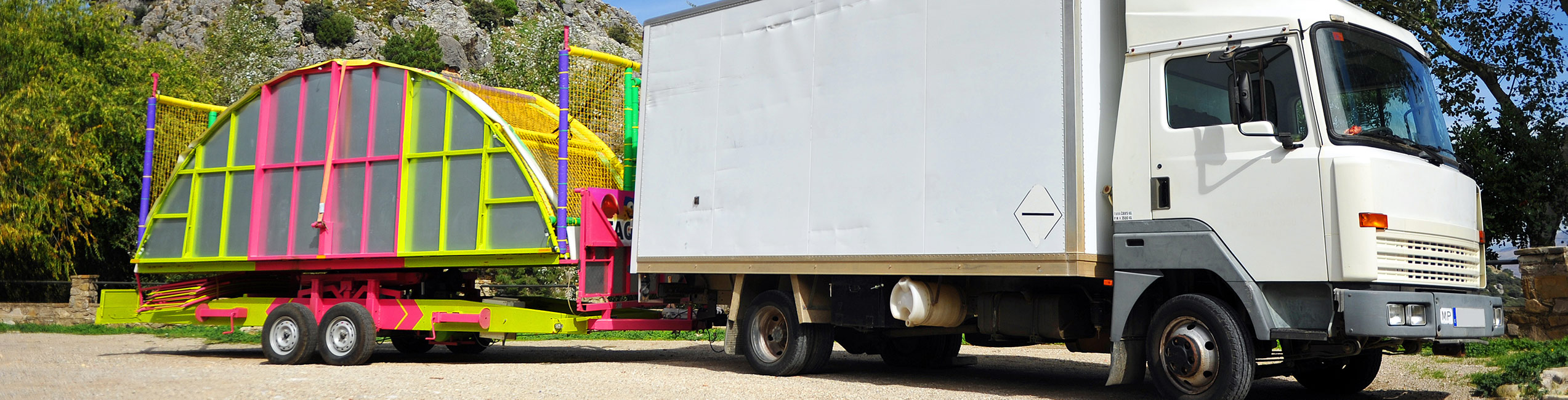 Truck carrying carnival equipment